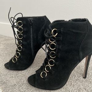 Black suede lace up peep toe heels with gold rings